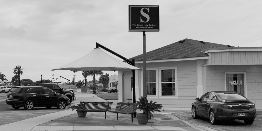 About The Strand Hair Designs